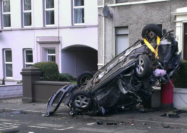 Eilish Gorman's Mazda car was parked 20 yards down the road before it was smashed and overturned by the driver of the stolen fire engine at Glenarm Road, Larne, around 4.30am on Saturday