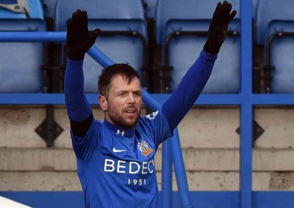 Glenavon's Declan O'Brien
celebrates after scoring to make it 1-0
during Saturday's Irish Cup tie at Mourneview Park.
Photo by TONY HENDRON/Presseye.com.
