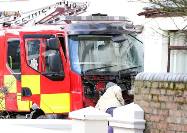 5 March 16 - Picture by Darren Kidd / Press Eye.

The scene on the Glenarm Road in Larne where a fire engine which had been stolen from the townÃ¢Â¬"s Fire Station during the night crashed into a number of cars and houses.