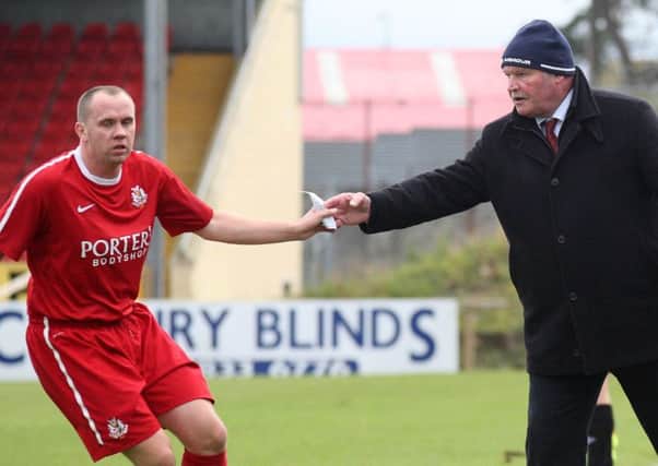 Richard Clarke (left) spent almost two decades at Portadown under manager Ronnie McFall (right).