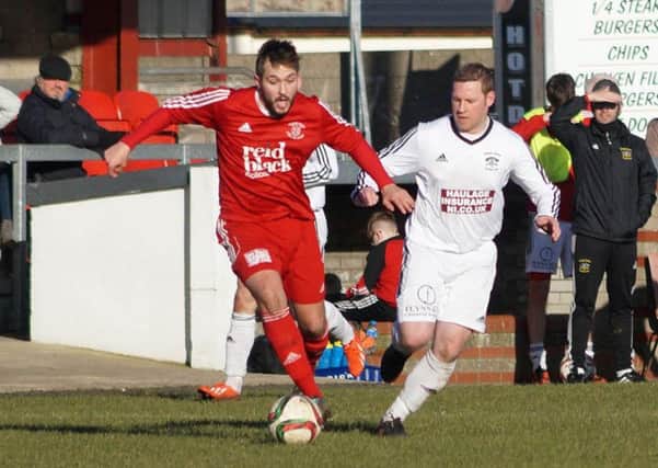 Ballyclare's Johnny McClurg in possession in Saturday's 2-2 draw with Annagh United. INLT 10-902-CON