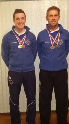 Dromore man Mark Walker and John Shannon display their medals.