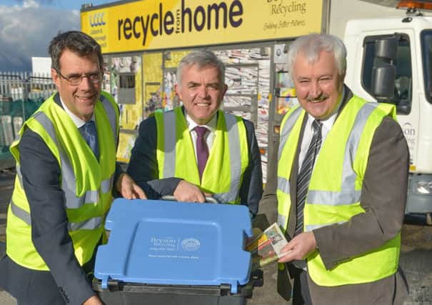 Enterprise, Trade and Investment Minister Jonathan Bell with Eric Randall, Director of Bryson Recycling (left) and John McMullan, Chief Executive of Bryson Charitable Group (right). INNT 10-523CON Pic by Aaron McCracken, Harrisons