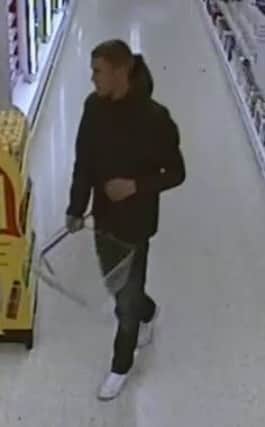 Police have released an image of a man they would like to speak to in relation to an incident of theft from a supermarket in Antrim.