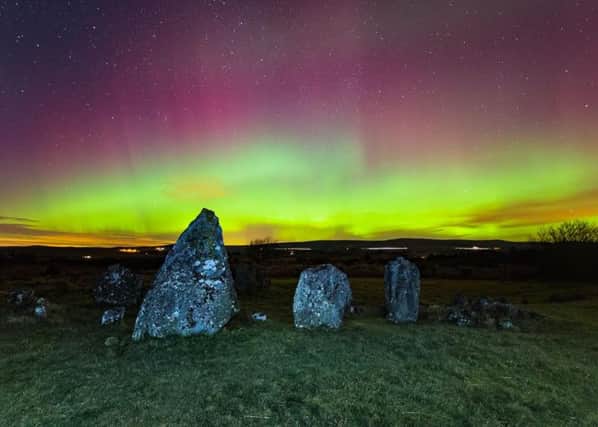 Amazing aurora display at Beaghmore Stone Circles and Lough Fea, captured by John Fagan