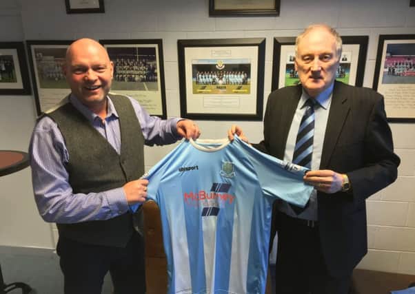 New manager David Jeffrey is welcomed to Ballymena United by club chairman John Taggart. Picture courtesy of Ballymena United FC.