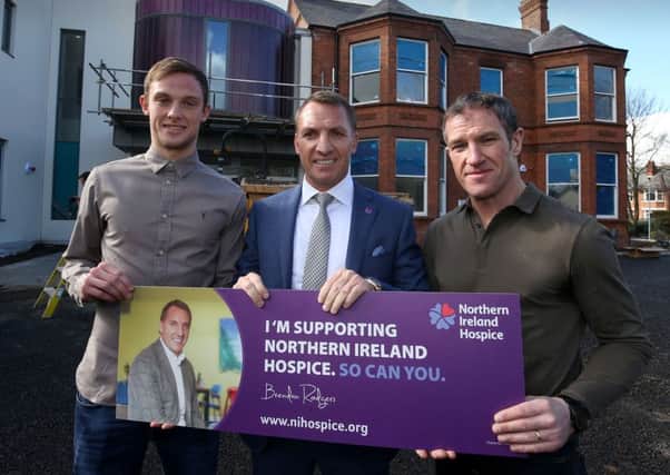 Ex-Liverpool boss Brendan Rodgers pictured with former Glentoran full-back Mark Glendinning (right) and his son, Reece, who plays for Linfield. INLT 10-922-CON