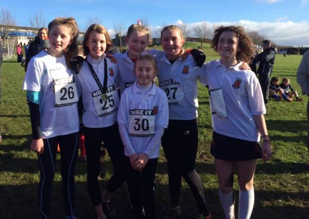 The Wallace High School mini girls cross country team who finished first overall in the recent Ulster Schools' cross country competition.