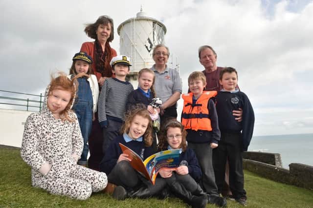 Pupils from Kilcoan PS and Mullaghdubh PS  meet Ronda and David Armitage, author and illustrator of the classic picture book series about Mr Grindling the Lighthouse Keeper. INCT 10-790-CON