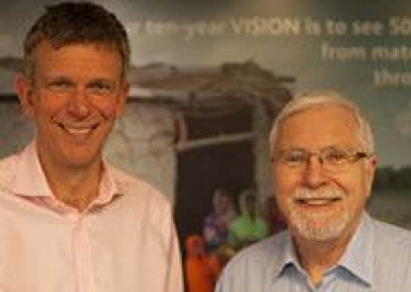 Tearfund chief-executive Nigel Harris and Bishop Harold Miller (right).