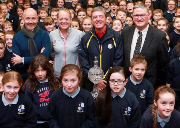 The children of Straffan National School joined (l-r) Brian McIlroy of the Rory Foundation, Antonia Beggs from The European Tour, Dubai Duty Free Golf Ambassador Des Smyth and Tom Walsh of Waterford Crystal to launch the Dubai Duty Free Irish Open Trophy Tour 2016.