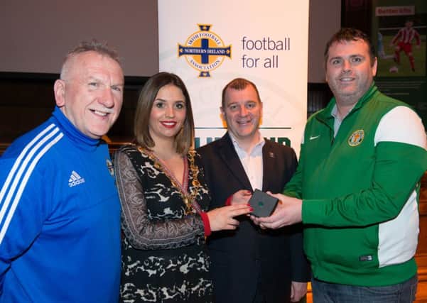 Derry City and Strabane District Council Mayor, Councillor Elisha McCallion has championed the work of the volunteers who have made a significant contribution to their local football club who participate in the Irish FA Games Development Centres, during an awards evening in The Guildhall. Included from left are, Joe Doherty, IFA, Patrick Nelson, Chief Executive Irish Football Association and Eamon McLaughlin, Top of The Hill Celtic. Picture Martin McKeown. Inpresspics.com. 10.03.16