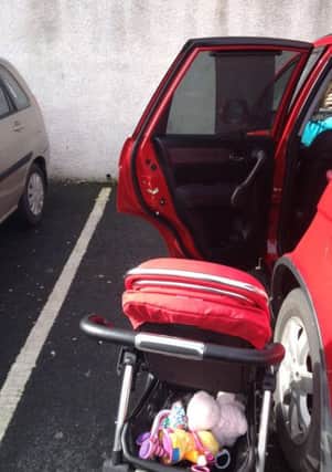 A photo of the space in which one local man parked on Saturday in order to lift his child's car seat out of his vehicle.