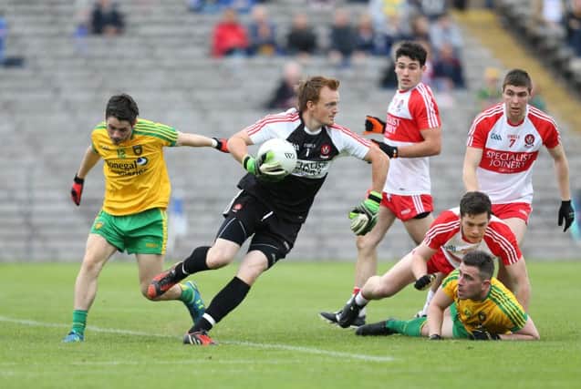 Thomas Mallon is back at No. 1 as Derry make the trip to Portlaoise this weekend.