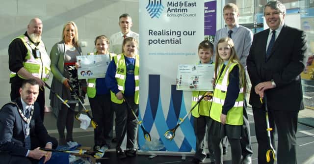 Cllr Timothy Gaston, Mid and East Antrim Borough Deputy Mayor, left, is shown with Borough Warden, Gary Gordon; Karen McMaster, Principal of Camphill Primary, pupils, Aileen and Sarah Macfarlane; Kevin Woodin, Borough Environmental Health Officer; Fourtowns pupils, Alex Jess and Caitlyn Brown; teacher Neil Bevington and Principal, Jim Millar.