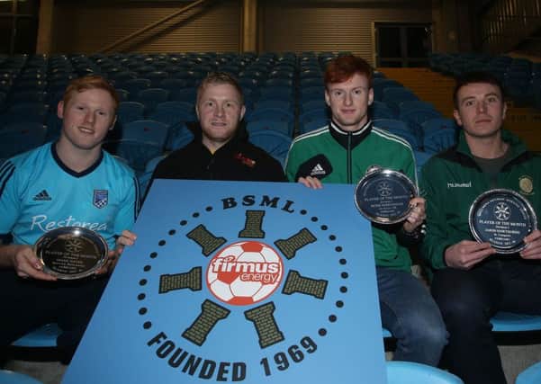 Donald Crawford, of sponsors firmus energy presents the Ballymena Saturday Morning League Player of the Month Awards awards for February to, L-R, Mark Hayes of Sporting Ballymoney (Div 3), Peter McReynolds of All Saints (Div 1) and Jason Hawthorne of St Comgall's (Divi 2). INBT 11-176CS