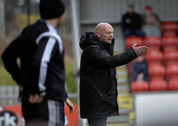 David Jeffrey watches from the dugout during his first game in charge of Ballymena United at Crusaders this afternoon. Picture: Press Eye.