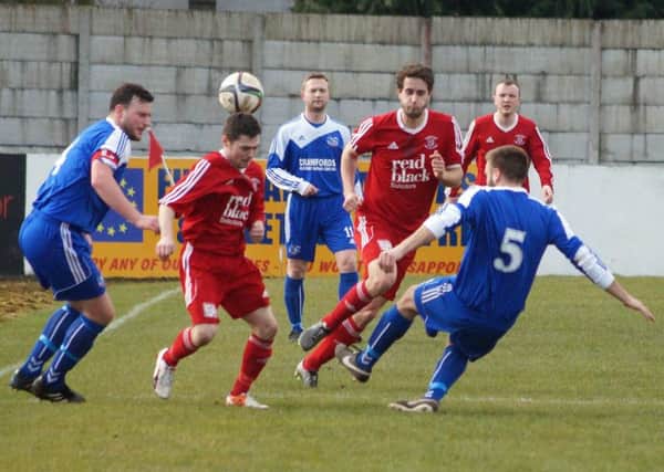 Ballyclare's Gary Brown tries to get to the ball first against Amateur League side, Albert Foundry. INLT 11-908-CON