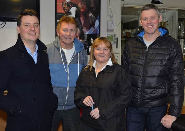 Brian OHara, Johnny Sayers and Debbie Sayers and Tony Shaw organisers of the recent Northend United Youth Table Quiz in the Michelin Athletic Club. INBT 07-177CS