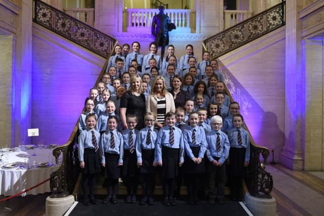 The Boys and Girls of Abercorn Primary School Choir with teacher Mrs Pauline Wakeling and Jo-Anne Dobson MLA in the Great Hall at Stormont. Picture: Michael Cooper