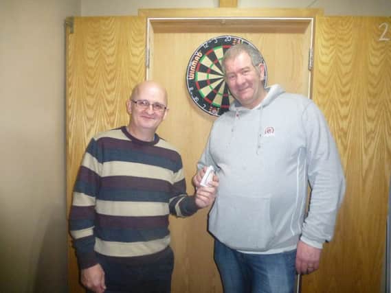 J.Watt winner of the open competition presented by A.Archibald, Chairman of Ballymoney Darts League.