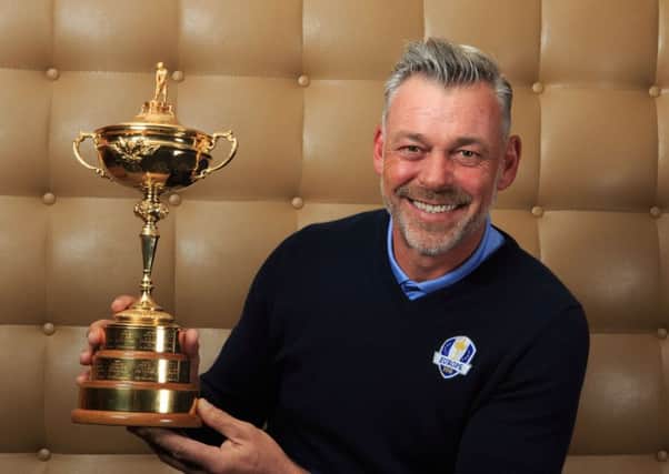 European Ryder Cup captain Darren Clarke holds the Ryder Cup trophy during the media day at the Sofitel Heathrow, London. PRESS ASSOCIATION Photo. Picture date: Monday March 23, 2015. Photo credit should read: John Walton/PA Wire