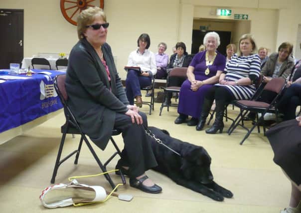 Josephine with her guide dog Marcel at Broughshane WI.