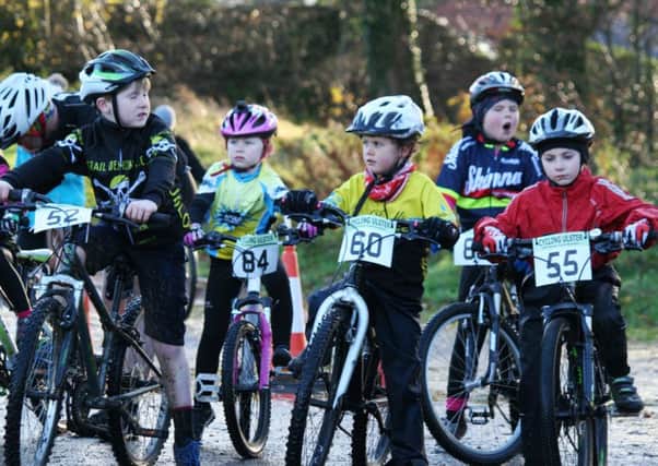 A group of young cyclists enjoying last year's 'Sprocket Rockets' programme in St. Columb's Park