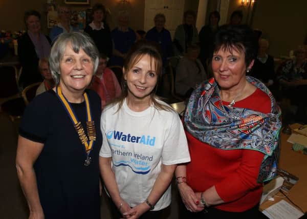 Water Aid volunteer Bernie McLean who gave a talk to members of Ballymena Inner Wheel at their meeting in Leighinmohr House Hotel, which was held to mark International Women's Day, is seen here with President Esther Cahoon and Shirley McCune International Organiser. INBT 11-106JC