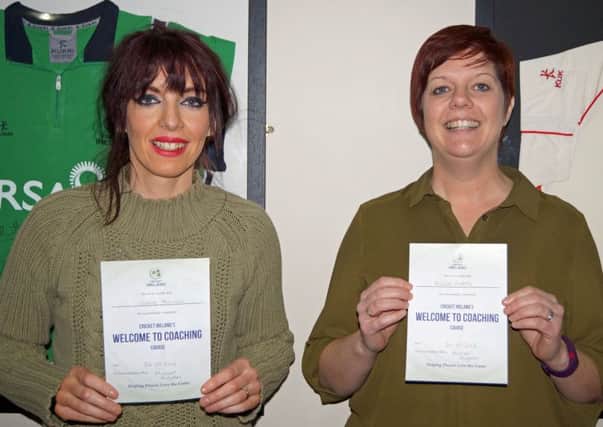 Laurelvale's Joanne Harrison (left) and Nicola Roberts show off Introduction To Coaching certificates following the Cricket Ireland course.