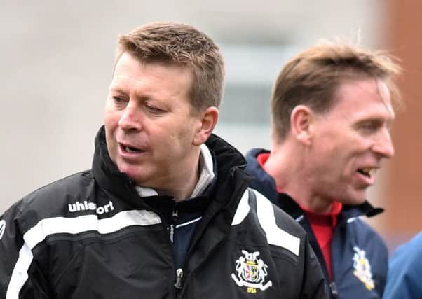 Pat McGibbon (left) on his first matchday as interim Portadown manager alongside Vinny Arkins, the club's all-time leading goalscorer and recent addition to the Shamrock Park backroom team. Pic by PressEye Ltd.