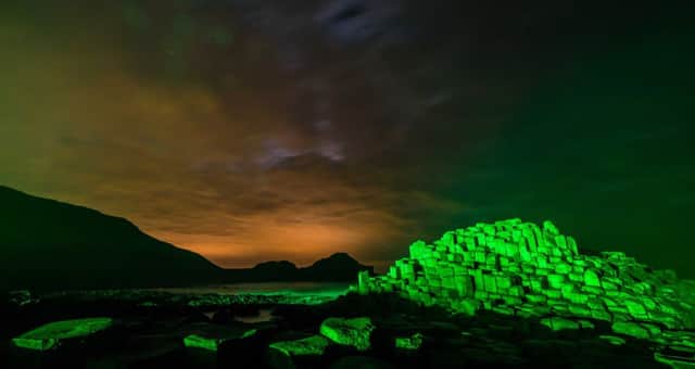 The Giant's Causeway  has been draped by a spectacular blanket of Green light as it gets ready to celebrate St Patricks Day. PICTURE MATT STEELE/MCAULEY MULTIMEDIA