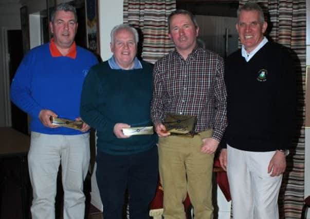 Winners of St Patrick's Day Scramble, Gary Lecky, Wyn Donnell and David Flanagan with City of Derry Club Captain Clive Brolly.