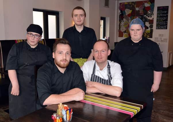 Staff and trainees at 180 Restaurant which looks set to close tomorrow (Saturday) due to lack of funding. Included are trainees, back row from left, Hannah Orr, Aaron Steele and Aine Toland. Front from left, Matthew Anderson and Stephen Reid, assessors. INPT12-219.