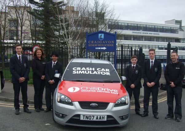 Craigavon Senior High School pupils, Luke Watson, Arjay Graviles, Ben Simpson and Jake Walker pictured with staff from Autoline.