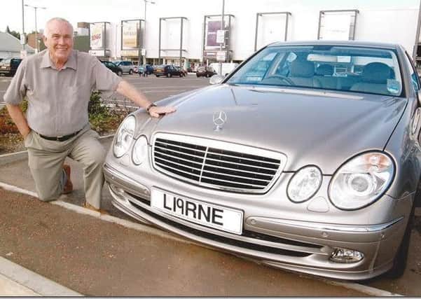 Charles Dempsey with the L19RNE numberplate. INLT-11-7701-con