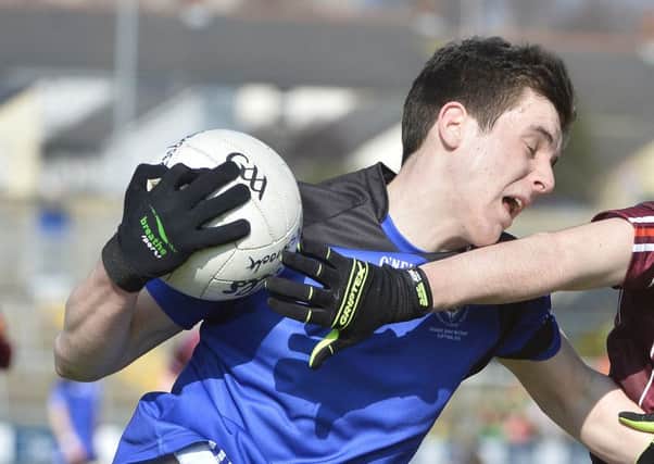 Press Eye - Northern Ireland -17th March 2016
Photograph: Stephen Hamilton /Presseye
Danske Bank MacRory Cup final between St Patrick's, Maghera and St Paulâ¬"s, Bessbrook at the Athletic grounds in Armagh.
St Patricks Shane McGuigan in action with St Pauls Declan Loye