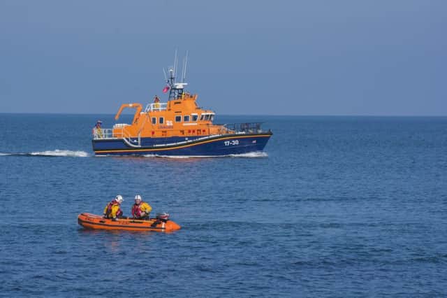 The two Portrush lifeboats at the Herring Pond Portstewart for the St Patrick's Day Duck Dive. INCR11-16 004BW.
Picture: BRIAN WILKINSON