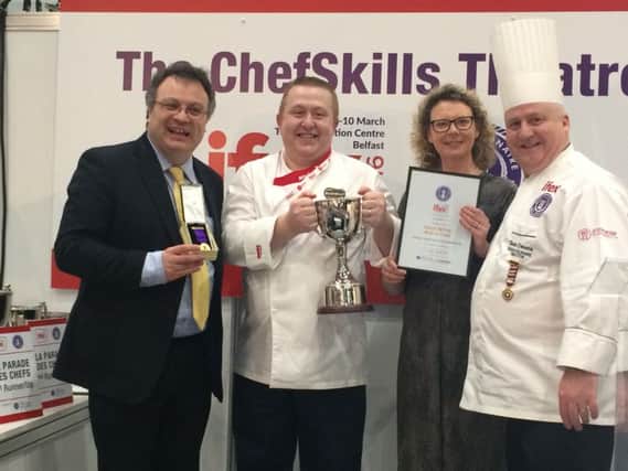 Pictured Darran Benham, Bushmills Distillery of Sodexo receiving his award from Employment and Learning Minister Stephen Farry and Salon Culinaire chef Sean Owens. INBM13-16S