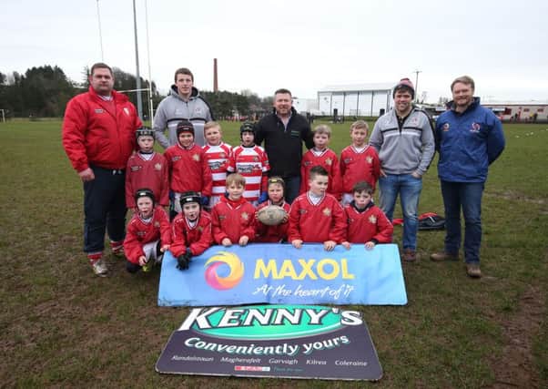 Ulster Rugby stars John Donnan and Jonny Murphy attended the recent Maxol Mini Rugby Festival in Randalstown. They are pictured with some of the youngsters who took part.