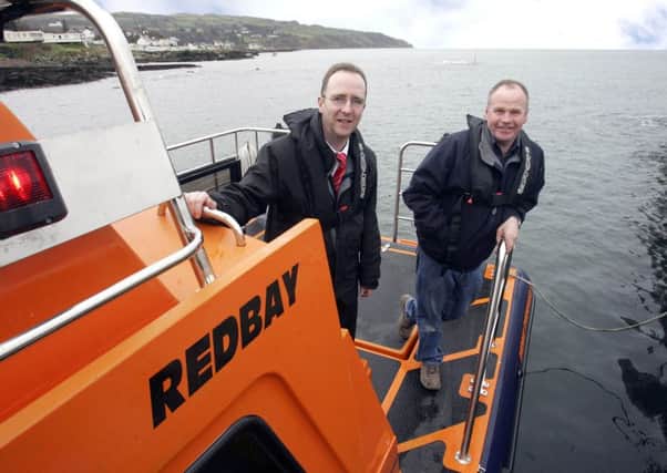 Des Gartland, Invest NI (left) with Tom McLaughlin, Redbay Boats, a number of years ago.