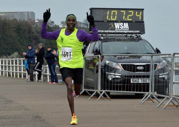 Gideon Kimosop Kipsang, from Project Africa, wins the 2016 AES Larne Half Marathon in a time of 1:07.28. INLT 11-006-PSB