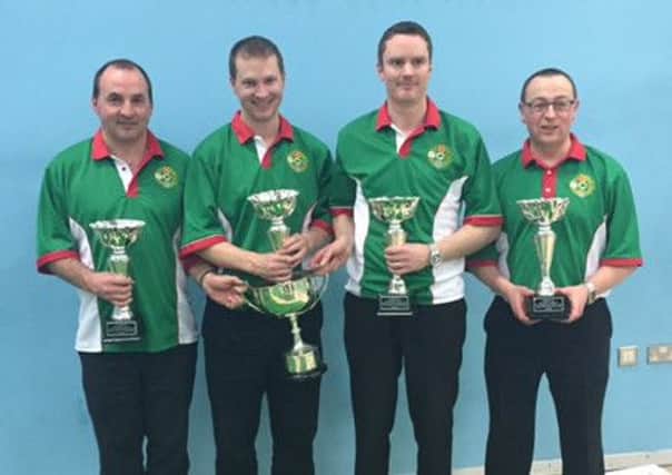 All Saints Tullylish rink of  DJ Wilson, Eddie Campbell, Jonny Wilson and Andy Leckey won the Fours at the World Championships in Leigh, outside Manchester, on Sunday.