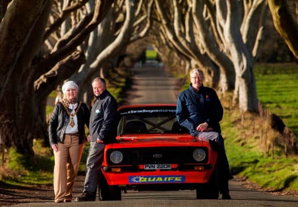 Causeway Coast and Glens Mayor, Cllr Michelle Knight-McQuillan (left) and Circuit of Ireland Event Director Bobby Willis (centre) were joined by Portrush co-driver Crawford Henderson (right) at the Dark Hedges to launch the Circuit in the Causeway Coast and Glens region.  Crews from all over the world will stop at the Dark Hedges for a passage control whilst Bushmills Distillery will be the venue for a rally regroup.