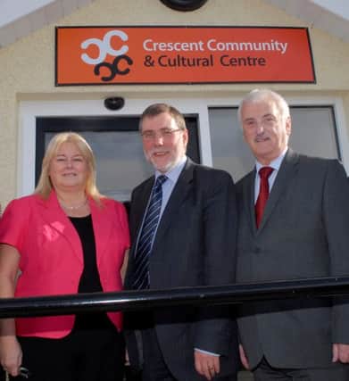 Social Development Minister, Nelson McCausland MLA, pictured at the official opening of the Crescent Communityt & Cultural Centre, Caw, with co-ordinator  Linda Watson and Alderman Drew Thompson. INLS4112-163KM