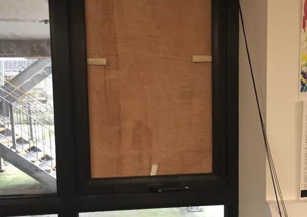 The broken window at Citizens Advice Bureau