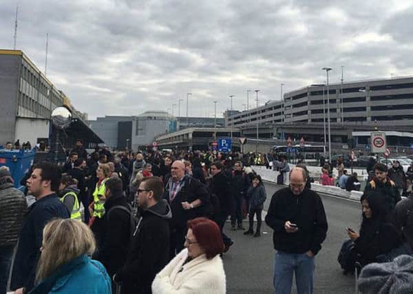 Handout photo taken with permission from the Facebook page of Bart van Meele of the scene at Brussels Airport after two explosions were heard.
