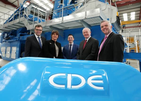 First Minister Arlene Foster and deputy First Minister Martin McGuinness are pictured with Alastair Hamilton, Chief Executive, Invest NI, Brendan McGurgan, Managing Director of CDE and Enterprise Minister Jonathan Bell MLA.

Picture by Kelvin Boyes / Press Eye.