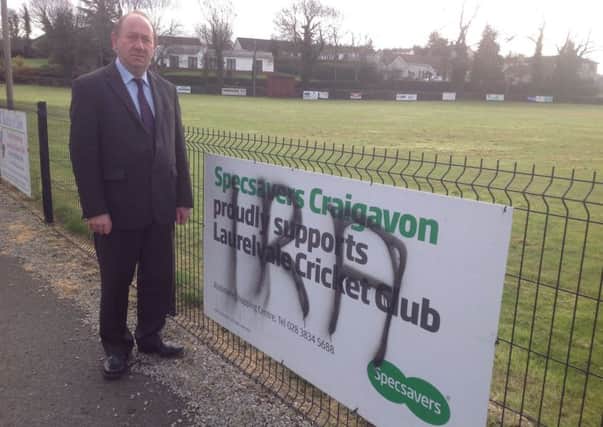 Image sent in on 29-03-16 of William Irwin at Laurelvale Cricket Ground

Added by AK

Accompanied by this release: 

Newry & Armagh DUP Assemblyman William Irwin MLA has slammed those responsible for vandalising advertising hoardings at Laurelvale cricket ground.
The hoardings were defaced with IRA graffiti and Mr Irwin said those responsible had nothing to offer the community in the area and demanded they "stop immediately".
Mr Irwin stated, "I totally condemn those behind this act of sectarianism, especially so as Laurelvale is a quiet and close knit community. Certainly the wider community would totally reject this sinister vandalism and in light of the fact that the letters IRA have been sprayed makes this all the more despicable and it must stop immediately."
He concluded, "There have been a number of concerning incidents across the borough orchestrated by republicans in recent days and the targeting of a valued community resource and sporting organisation in Laurelvale, shows just how out of touch with