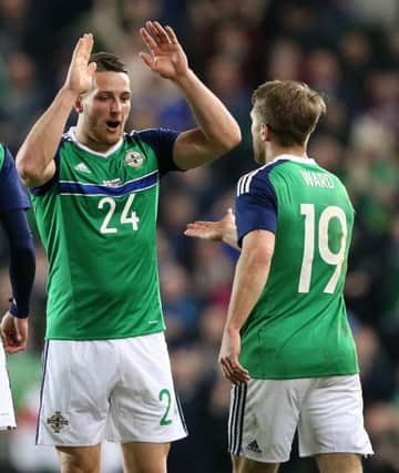 Northern Ireland striker Conor Washington celebrates scoring his Windsor Park debut goal against Slovenia. Picture by Brian Little/Presseye